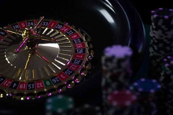 Live Sic Bo dealer studio with real dice cage and video broadcast setup